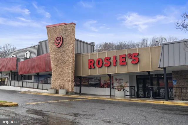 a sign on the side of a street