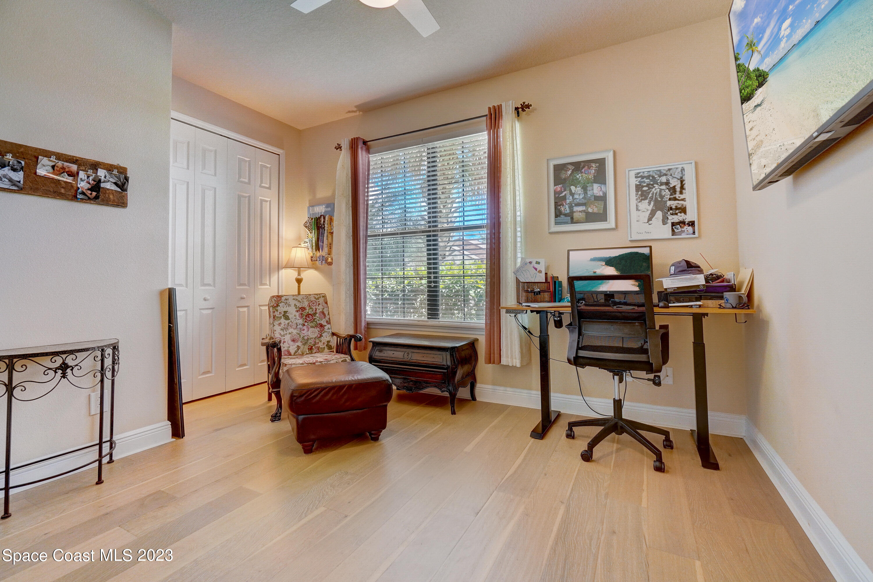 1568 Outrigger Circle Rockledge, FL 32955 - Photo 21 of 44 a living room with furniture and a window
