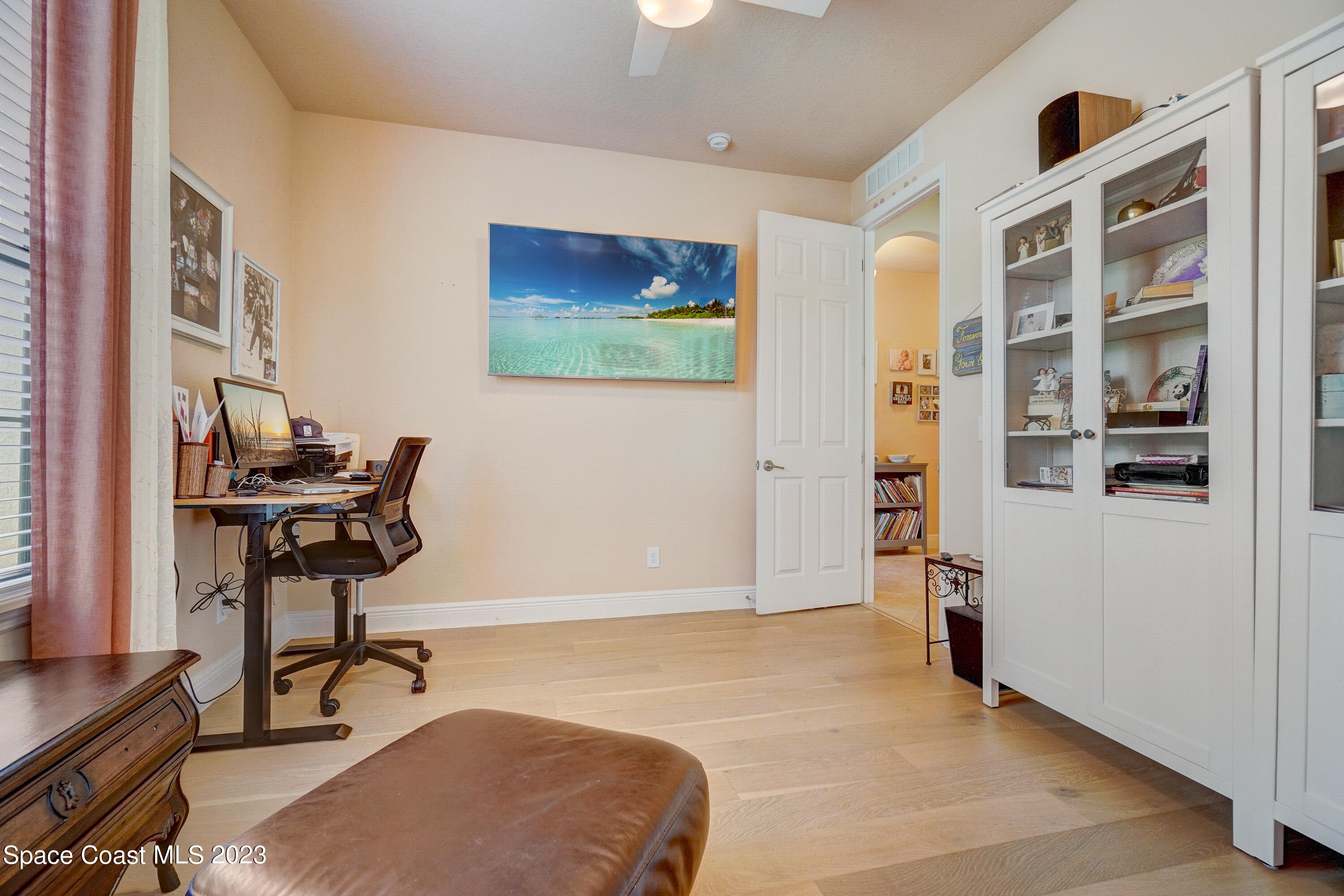 1568 Outrigger Circle Rockledge, FL 32955 - Photo 22 of 44 a room with furniture and a window