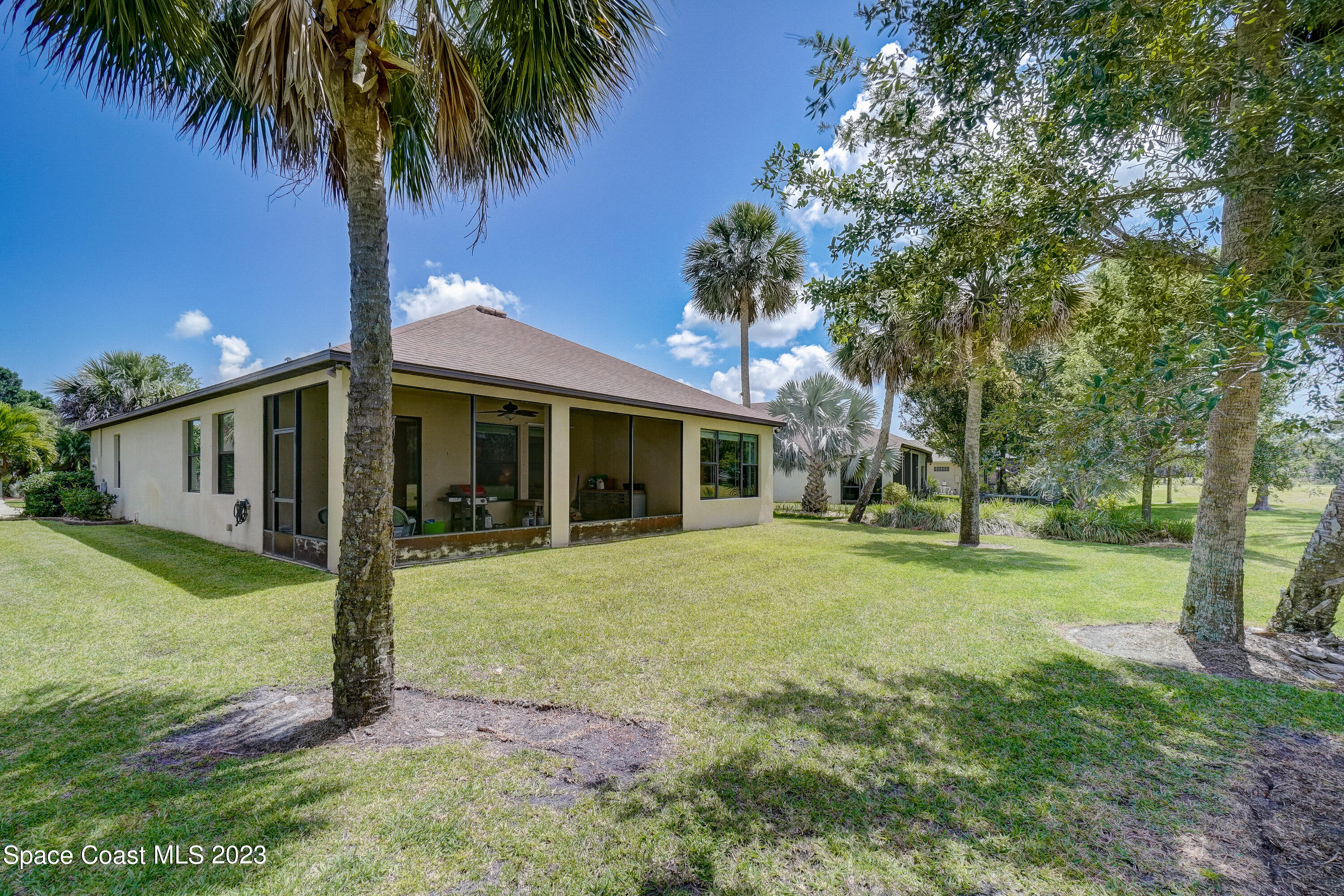 1568 Outrigger Circle Rockledge, FL 32955 - Photo 30 of 44 a front view of house with yard and green space