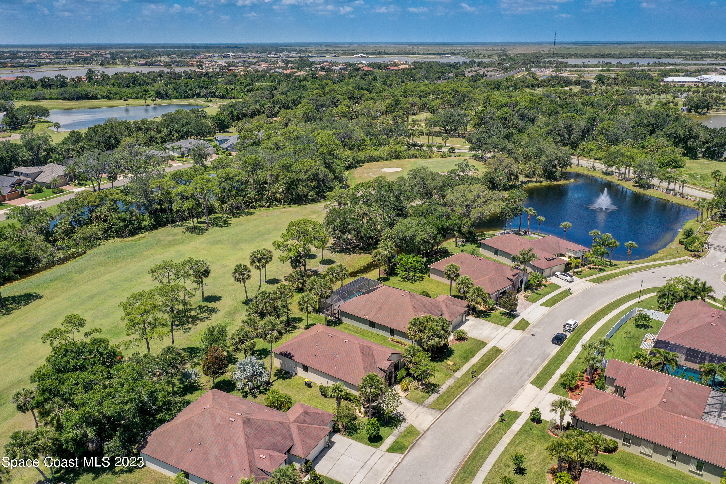 1568 Outrigger Circle Rockledge, FL 32955 - Photo 40 of 44 an aerial view of a city with lots of residential buildings