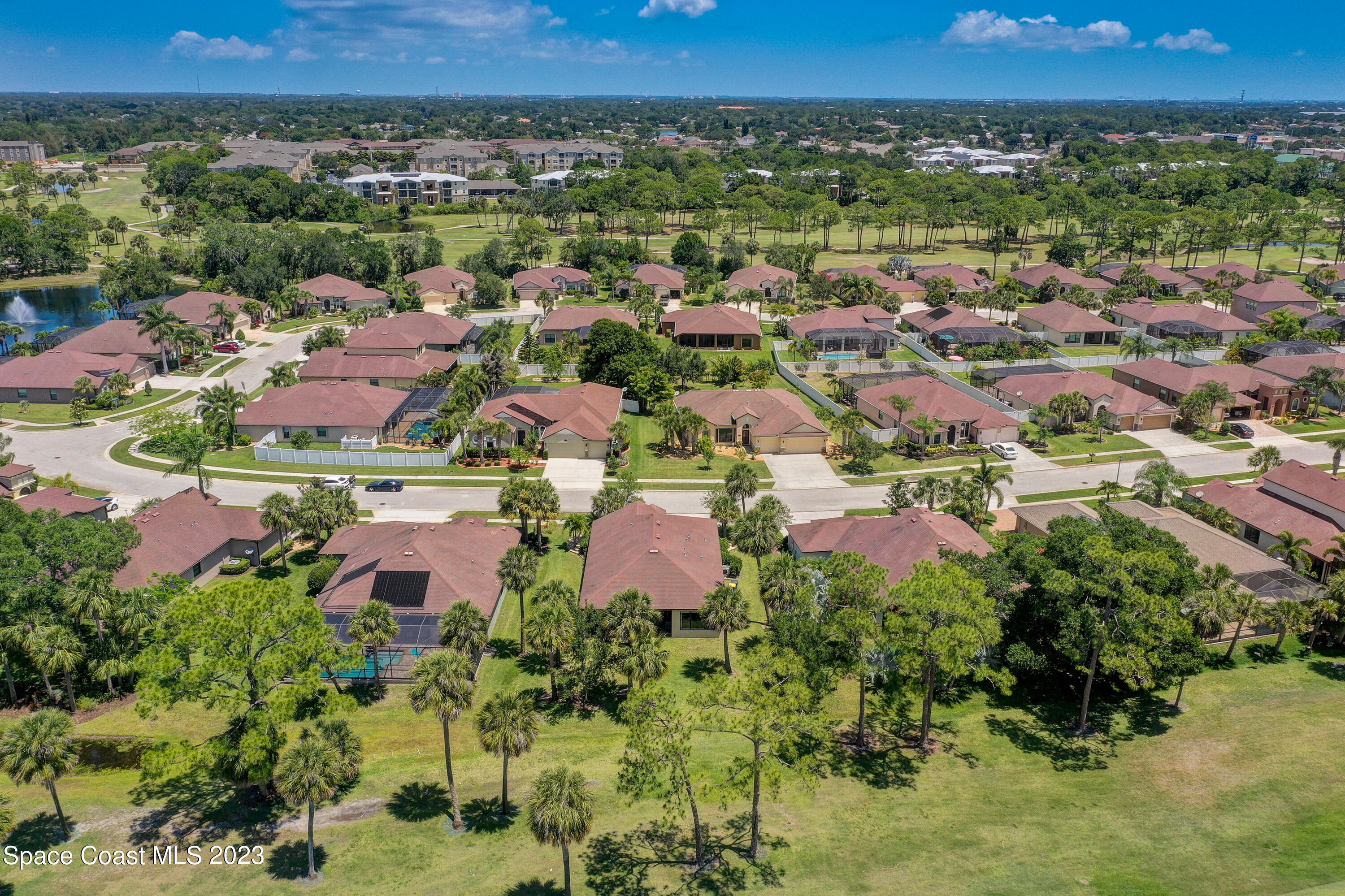 1568 Outrigger Circle Rockledge, FL 32955 - Photo 42 of 44 an aerial view of residential houses with outdoor space and trees