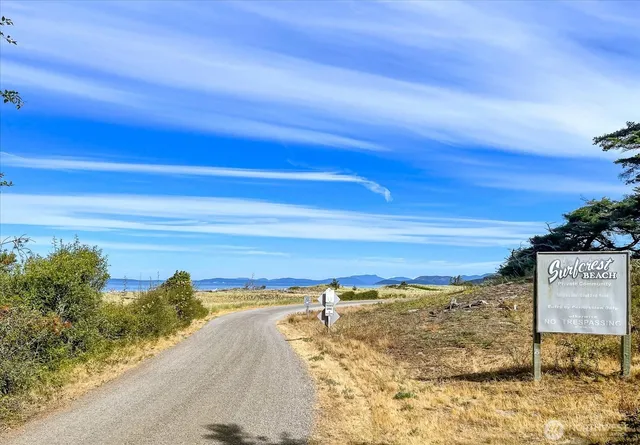 a view of a lake with mountains in the background