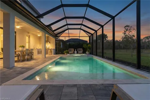 a swimming pool with a yard