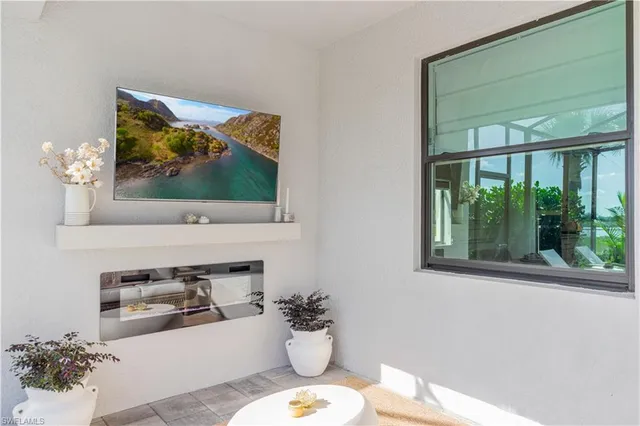 a kitchen with a sink and a stove top oven