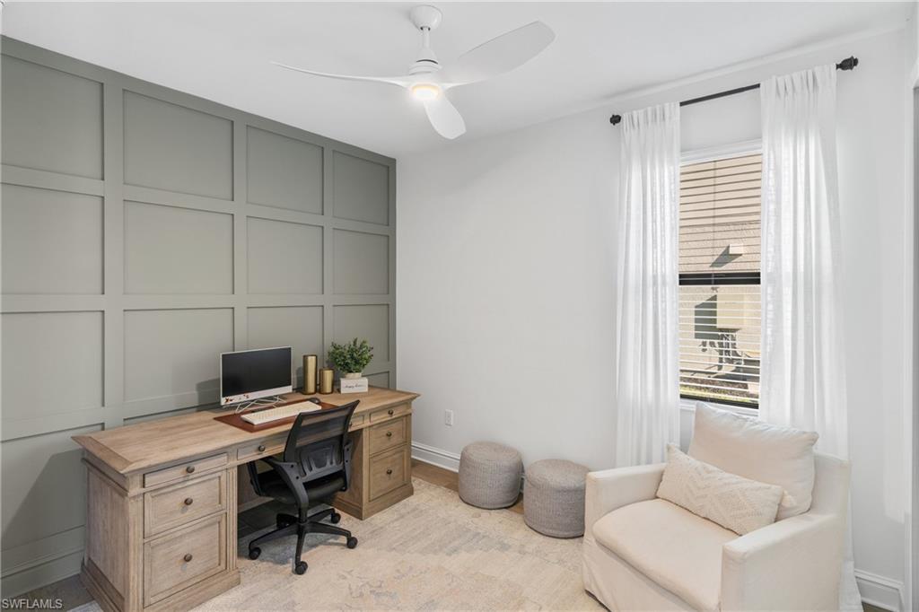 20507 Napa Loop Estero, FL 33928 - Photo 27 of 49 a view of a workspace with furniture and a window