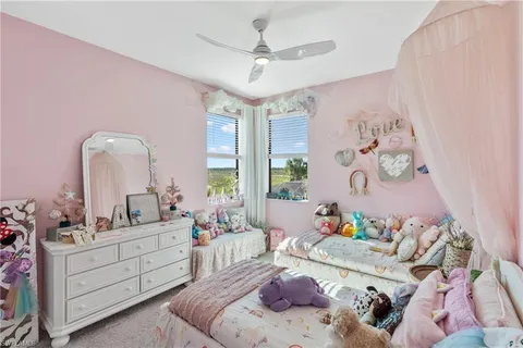 a living room with furniture and decor