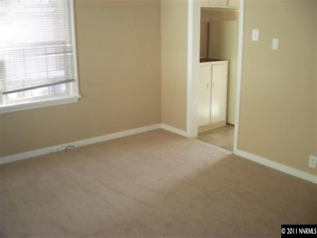 650 Burns Street Reno, NV 89502 - Photo 4 of 9 an empty room with windows and closet