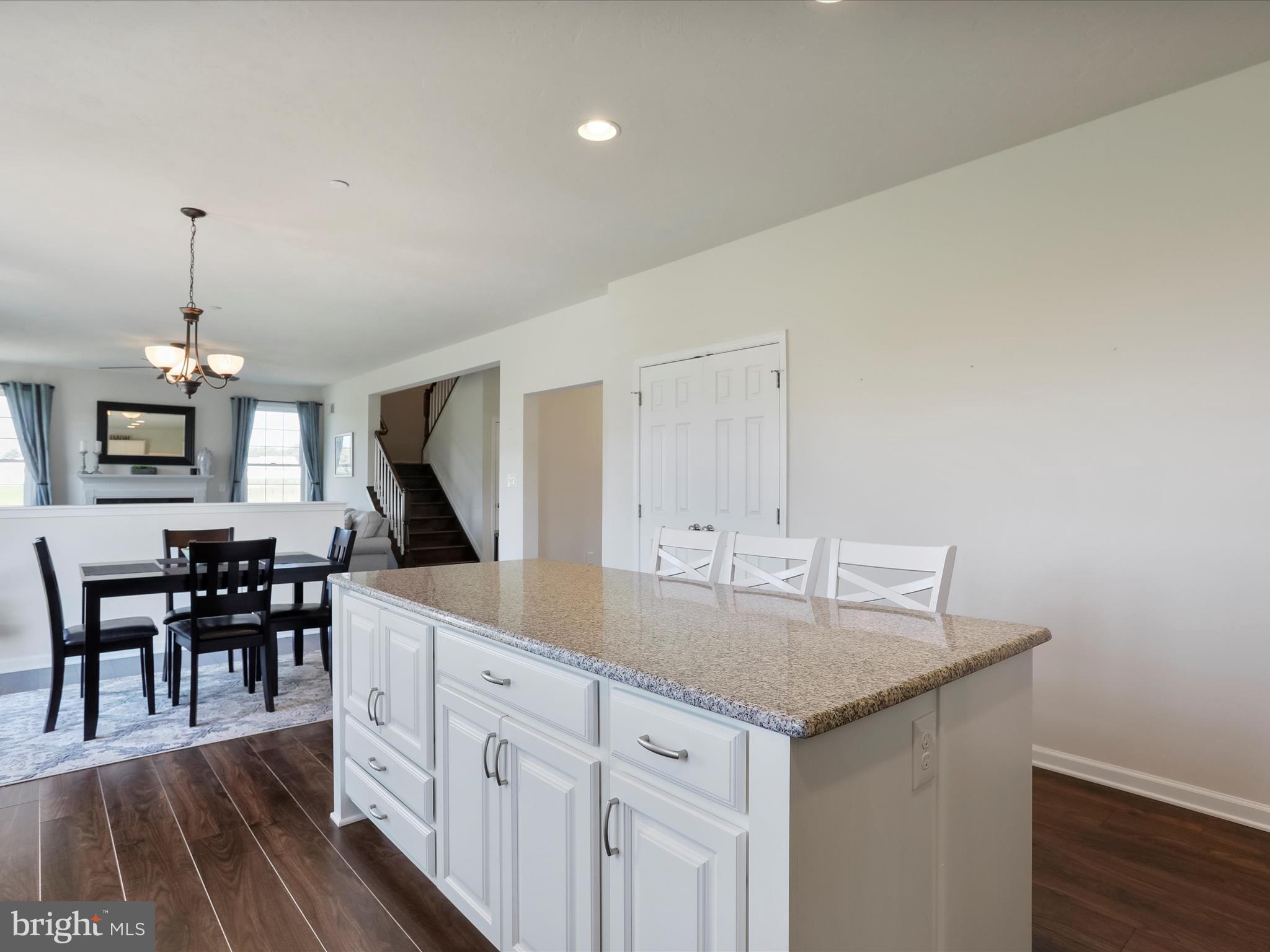 1147 Fox Run Terrace Hanover, PA 17331 - Photo 13 of 50 a view of kitchen island sink refrigerator and dining table
