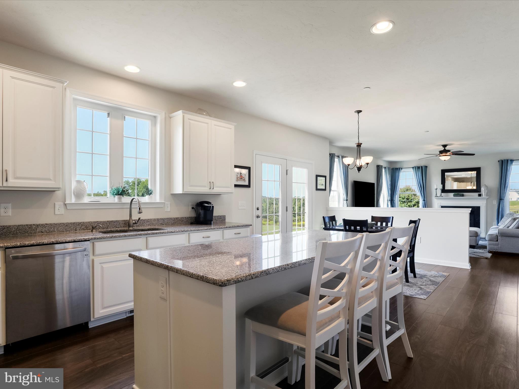 1147 Fox Run Terrace Hanover, PA 17331 - Photo 15 of 50 a kitchen with a table chairs sink and cabinets