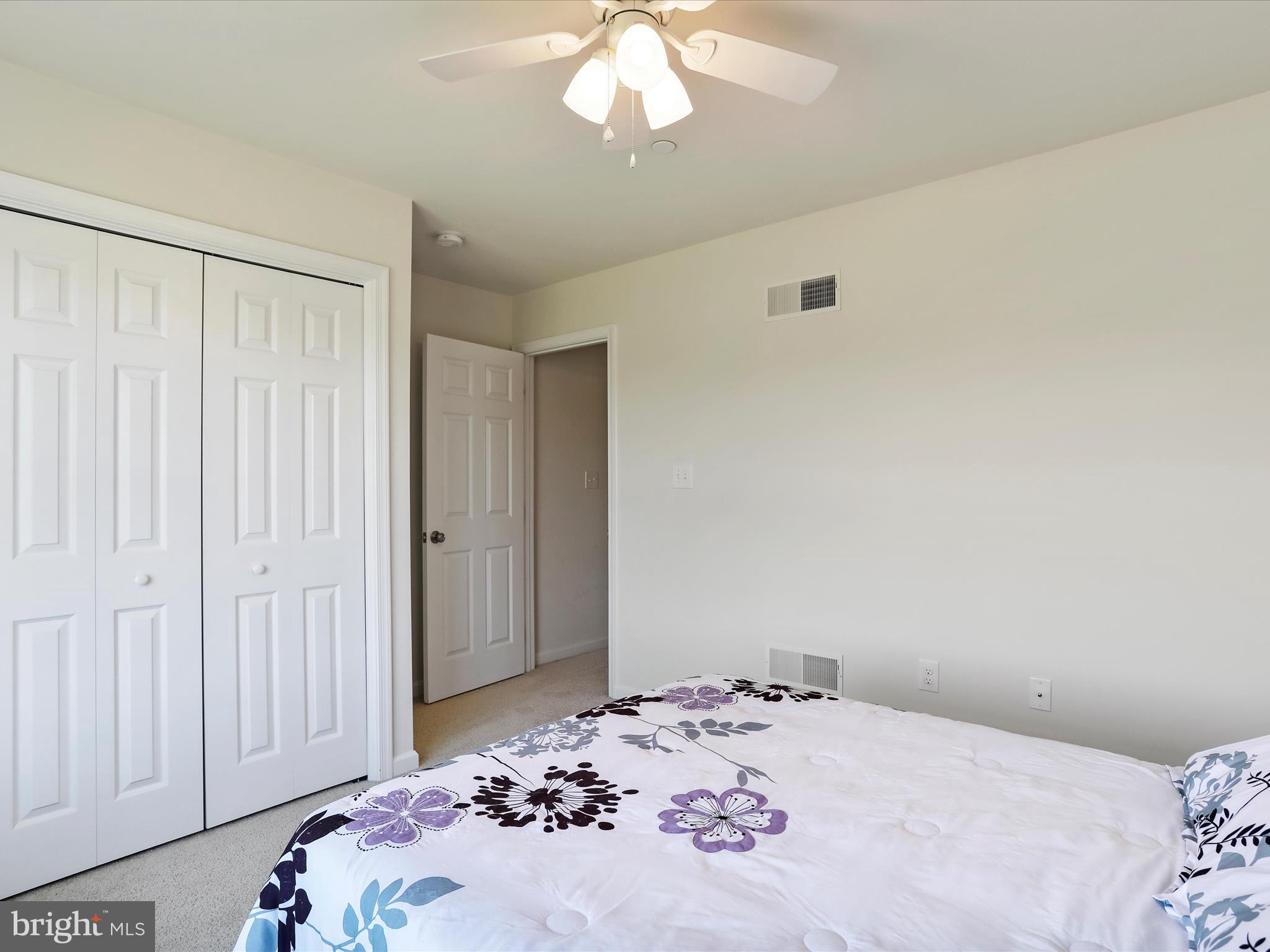 1147 Fox Run Terrace Hanover, PA 17331 - Photo 22 of 50 a bedroom with a bed and a chandelier