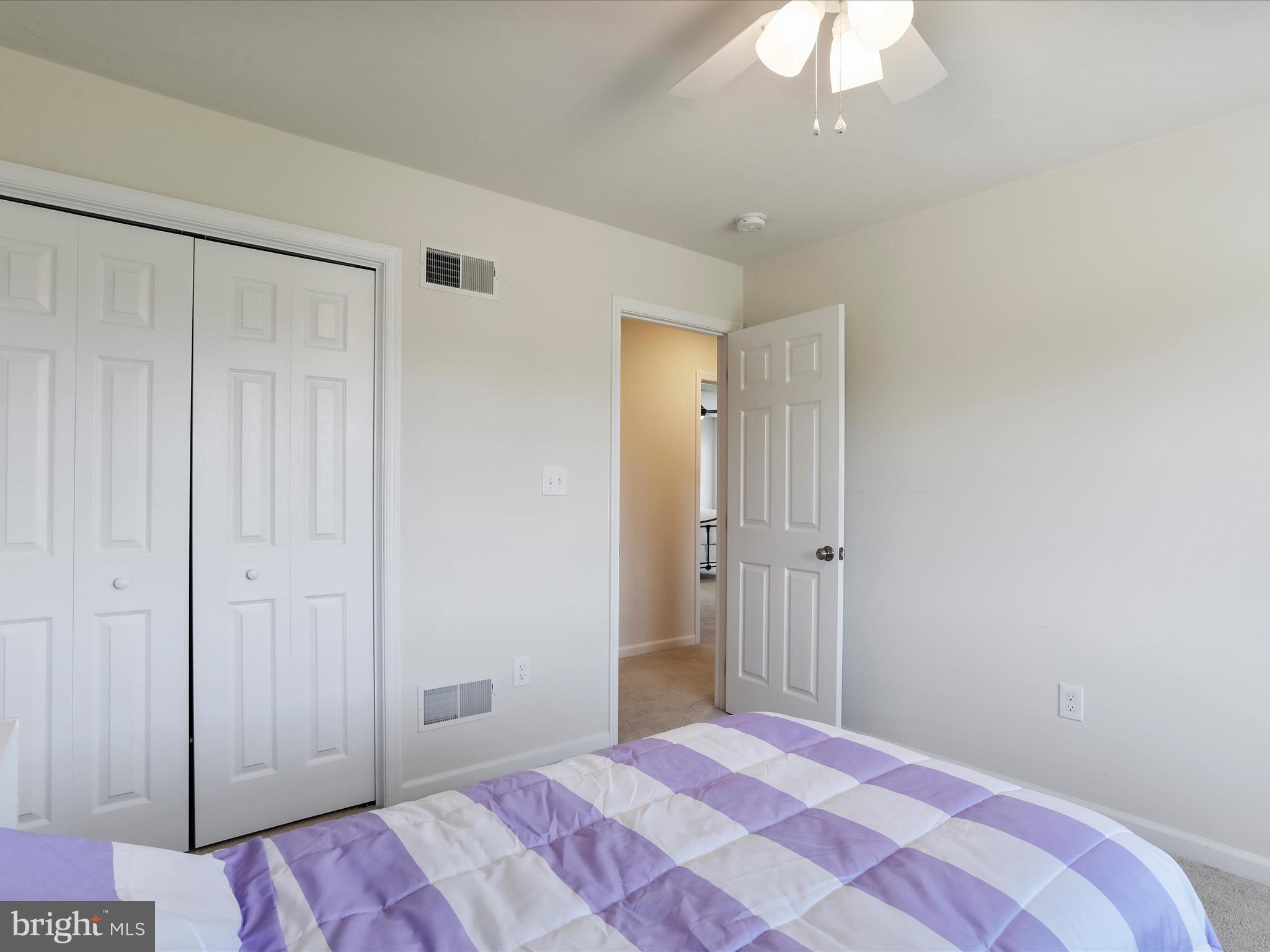 1147 Fox Run Terrace Hanover, PA 17331 - Photo 26 of 50 a bedroom with a bed and a chandelier fan
