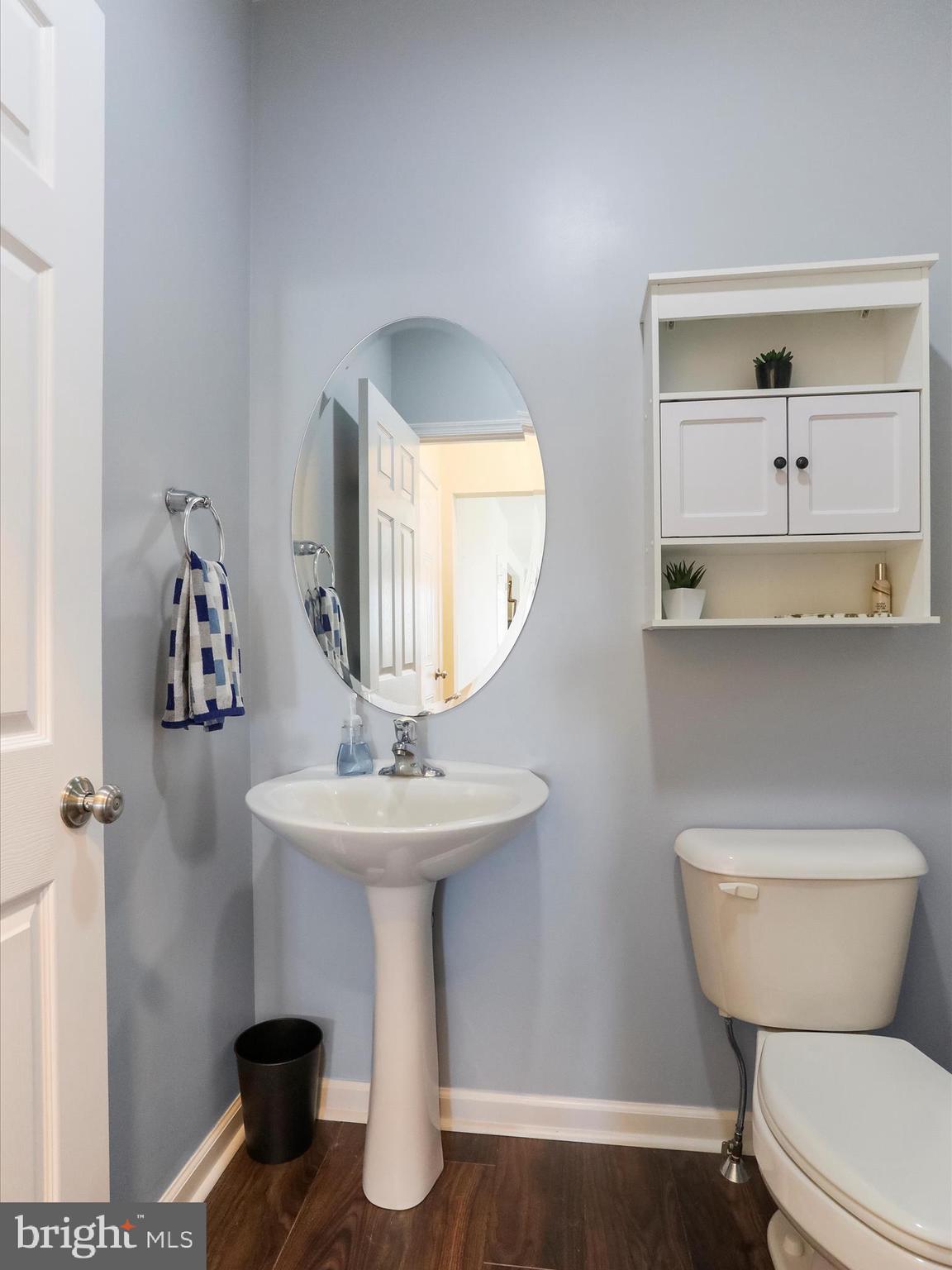 1147 Fox Run Terrace Hanover, PA 17331 - Photo 27 of 50 a bathroom with a toilet sink and mirror