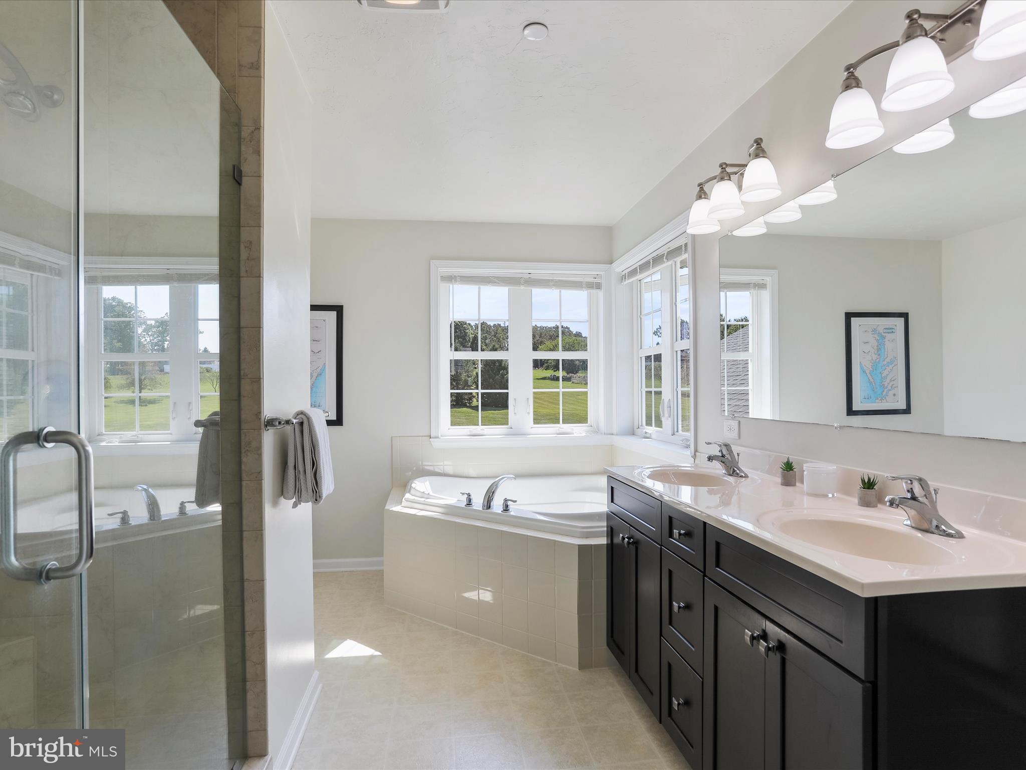 1147 Fox Run Terrace Hanover, PA 17331 - Photo 32 of 50 a spacious bathroom with a double vanity sink mirror and bathtub