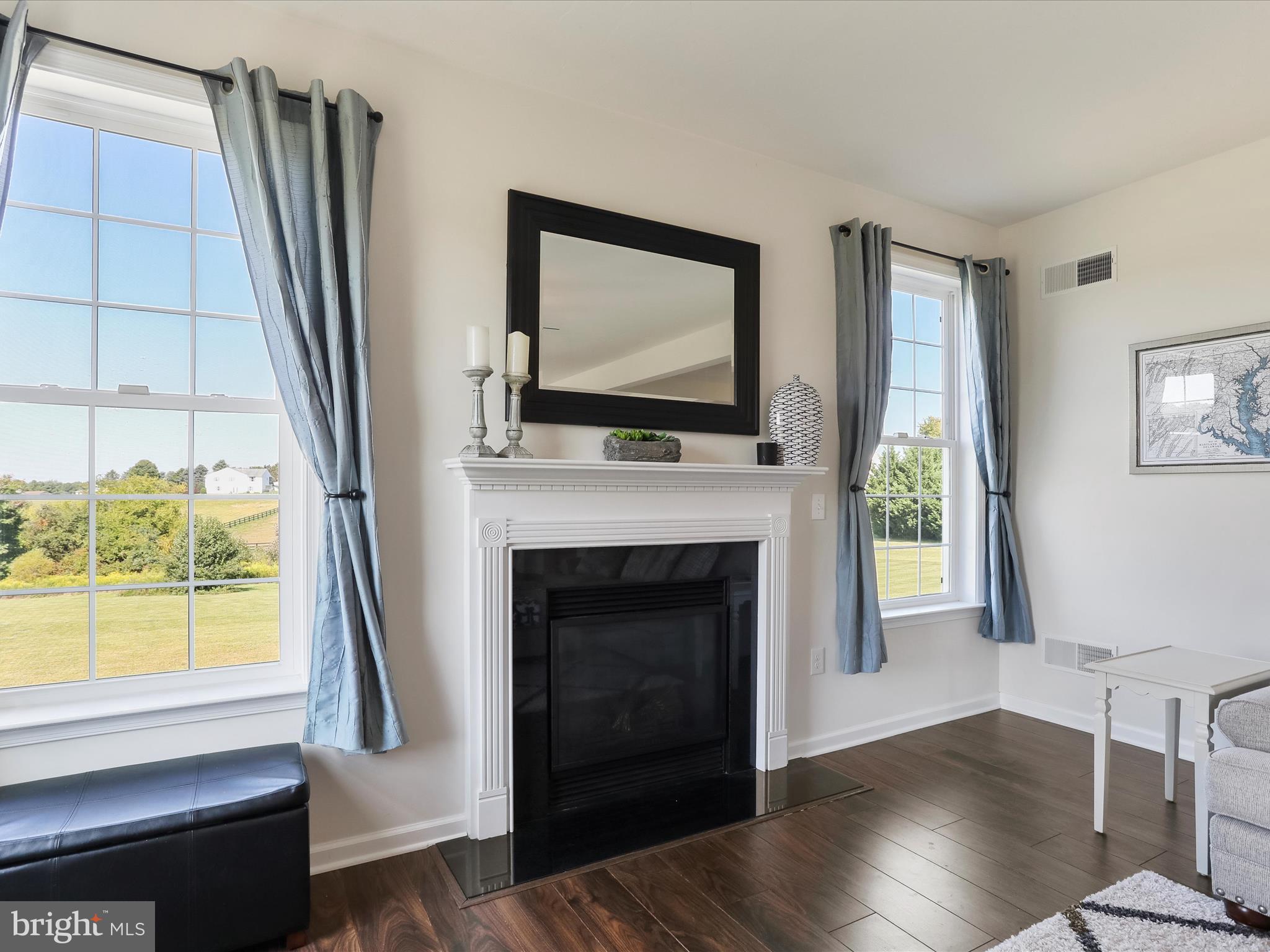 1147 Fox Run Terrace Hanover, PA 17331 - Photo 8 of 50 a living room with furniture fireplace and flat screen tv