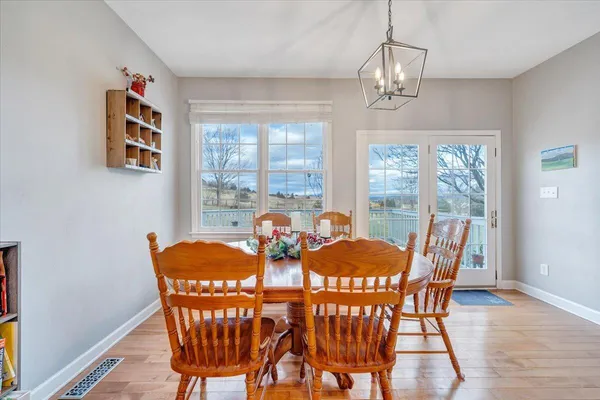 a bathroom with a double vanity sink mirror and shower