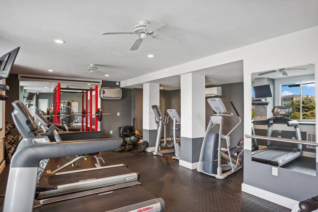 585 Dune Road Westhampton, NY 11978 - Photo 12 of 16 a view of a room with gym equipment