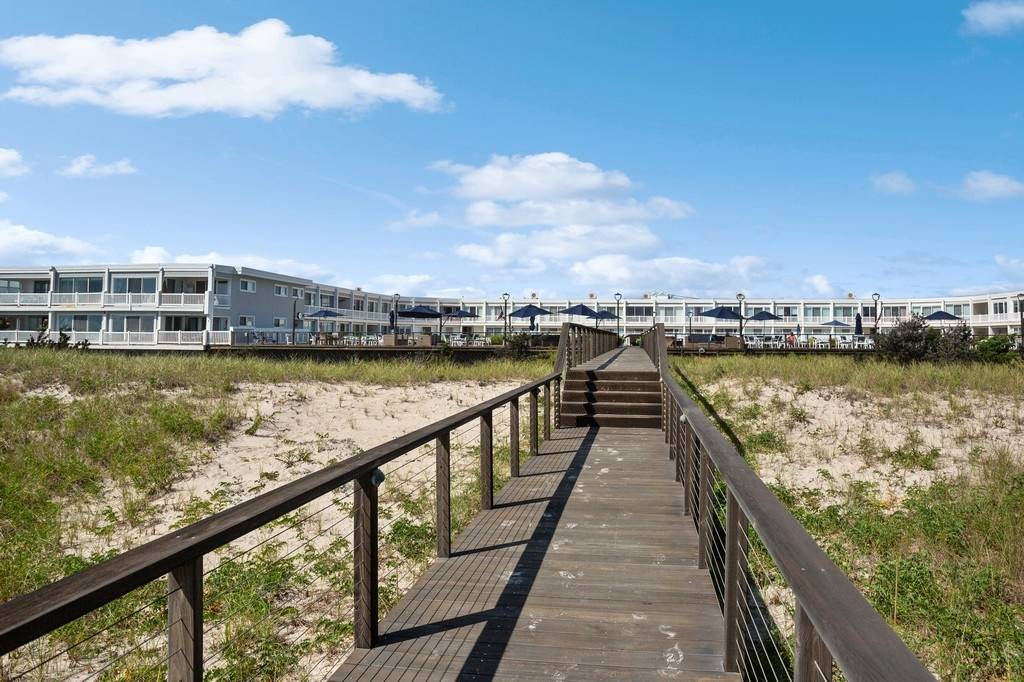 585 Dune Road Westhampton, NY 11978 - Photo 14 of 16 a view of swimming pool with a chairs