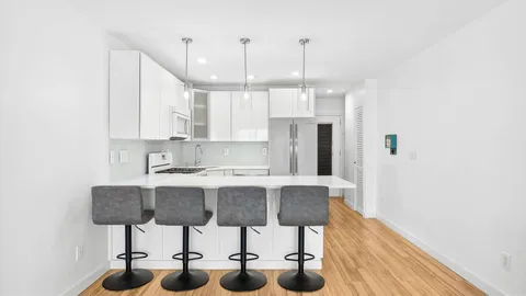 a view of kitchen with breakfast area