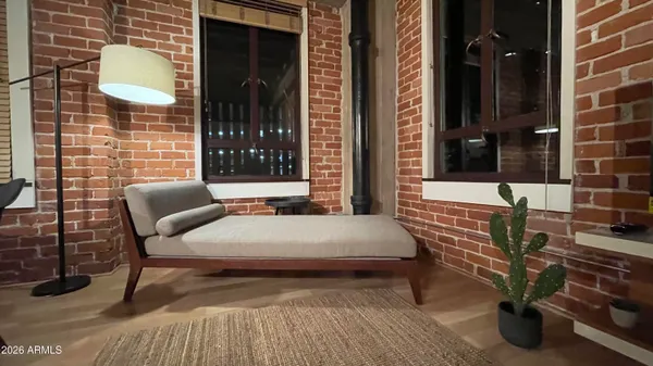 a balcony with furniture and window
