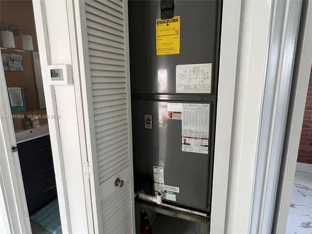 a view of a workspace with furniture