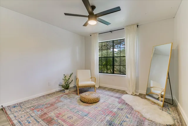 a workspace with furniture and window