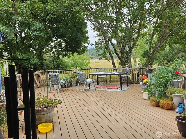 a view of a balcony with chairs
