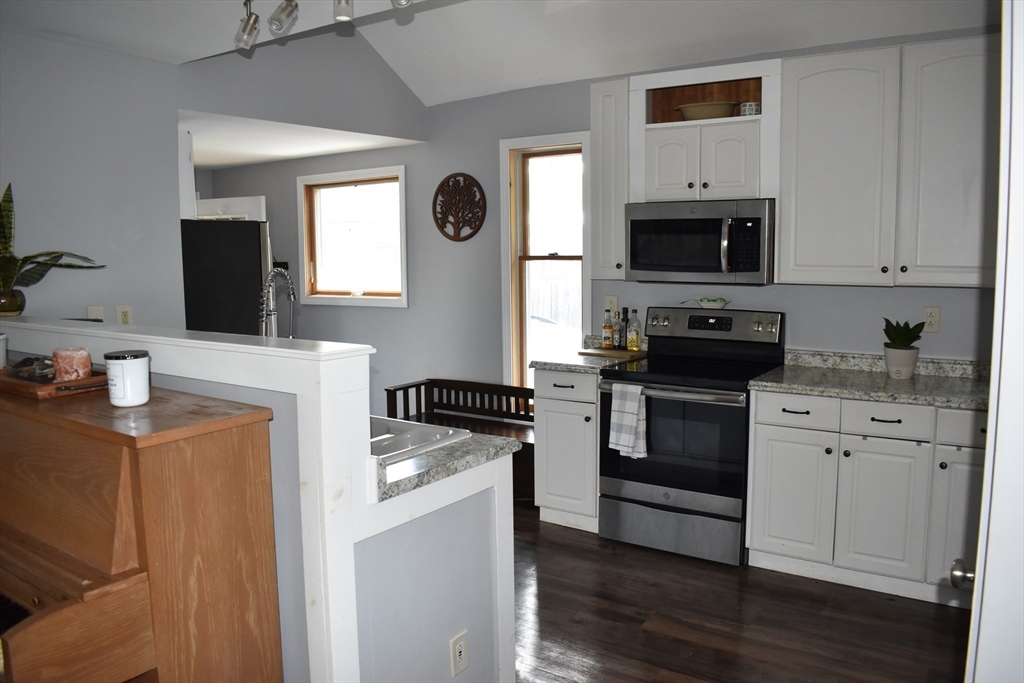 13 Charles Place Athol, MA 01331 - Photo 11 of 31 a kitchen with stainless steel appliances a stove microwave and sink