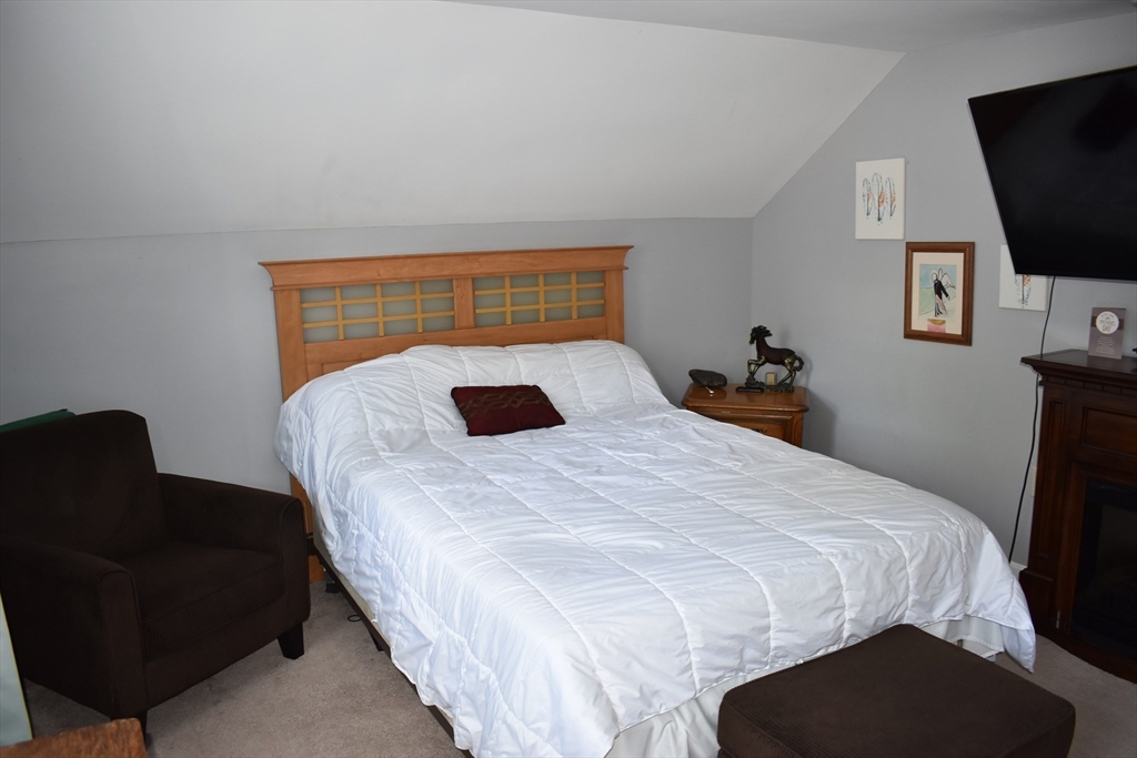 13 Charles Place Athol, MA 01331 - Photo 17 of 31 a bedroom with a bed and a television