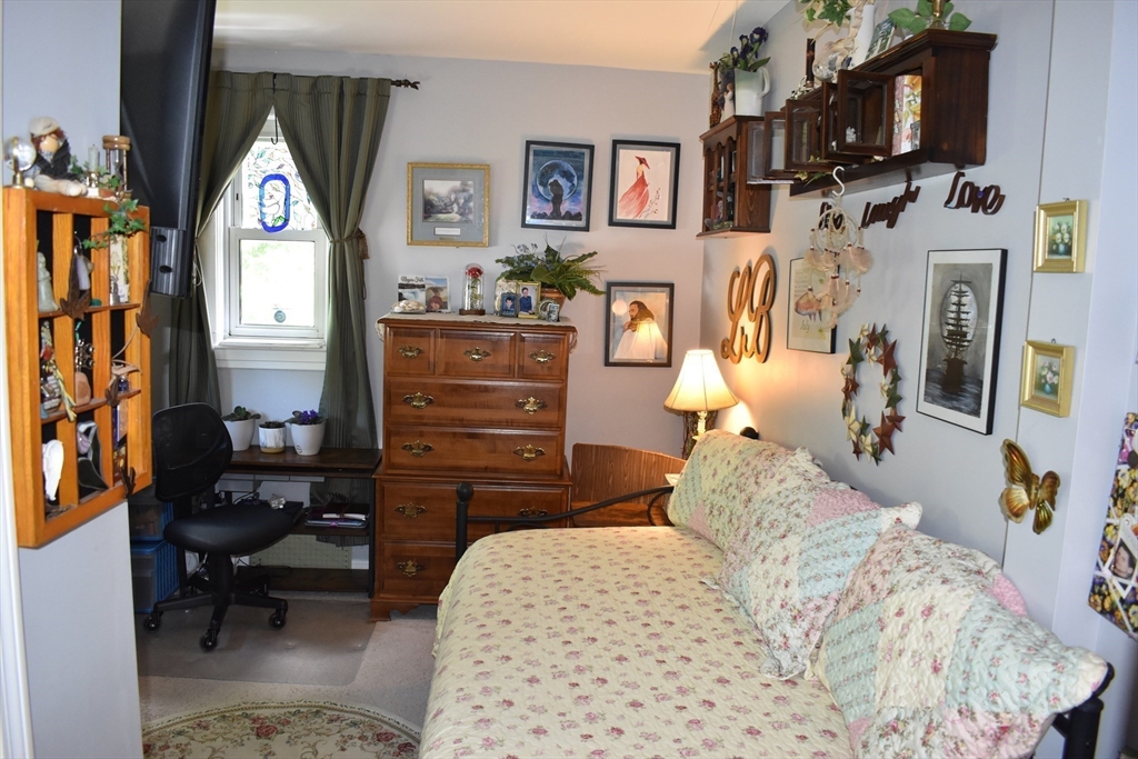 13 Charles Place Athol, MA 01331 - Photo 20 of 31 a bedroom with a bed a couch and dresser