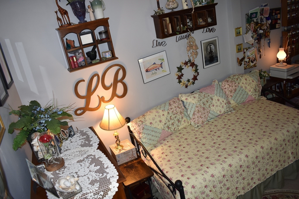 13 Charles Place Athol, MA 01331 - Photo 21 of 31 a living room with furniture and flowers