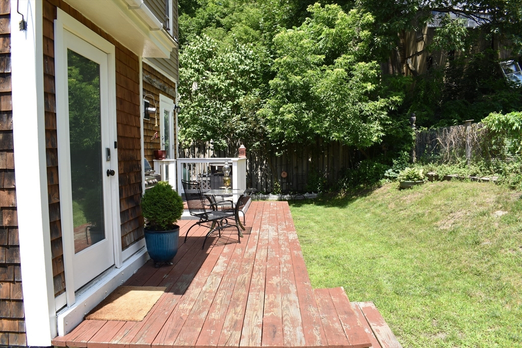13 Charles Place Athol, MA 01331 - Photo 7 of 31 a view of a patio with table and chairs potted plants and large tree