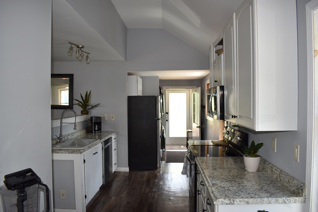 13 Charles Place Athol, MA 01331 - Photo 9 of 31 a kitchen with a refrigerator and a sink