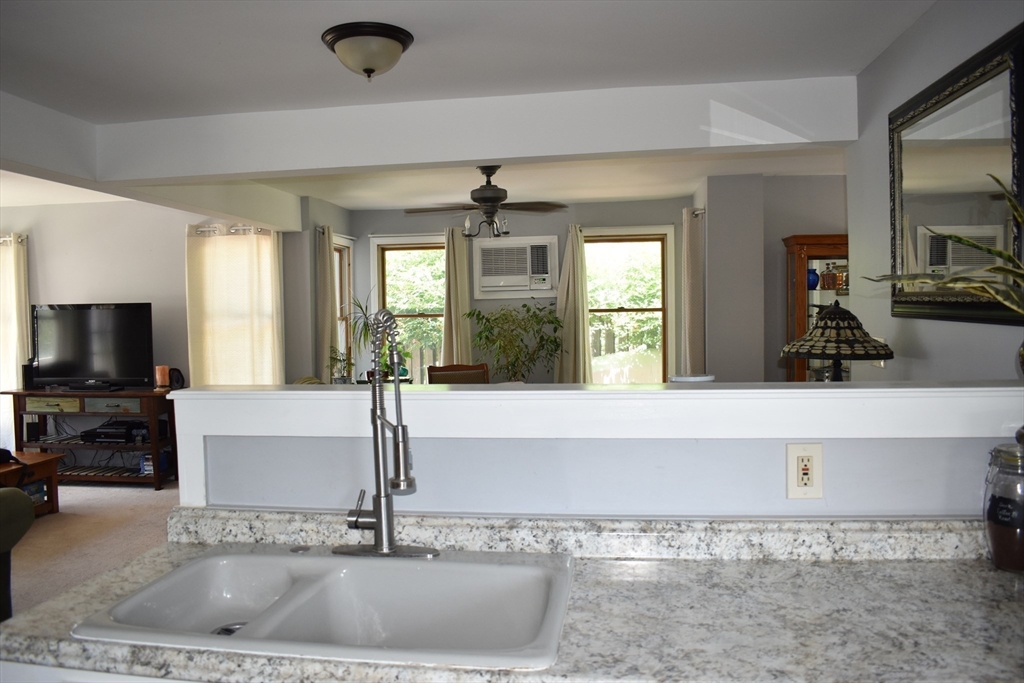 13 Charles Place Athol, MA 01331 - Photo 10 of 31 a view of living room with granite countertop furniture and a flat screen tv