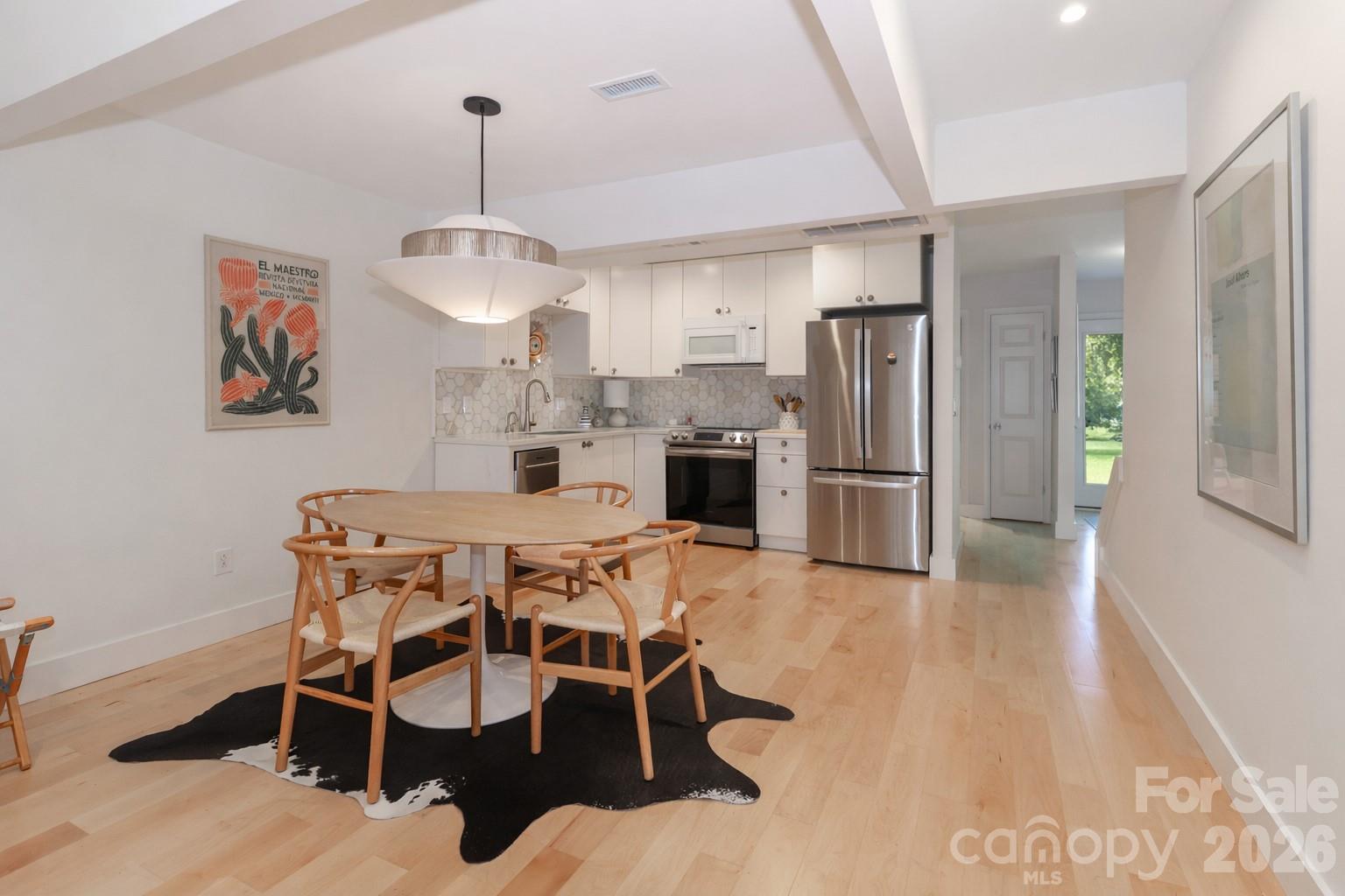 6622 Thermal Road Charlotte, NC 28211 - Photo 13 of 36 a dining room with furniture and window