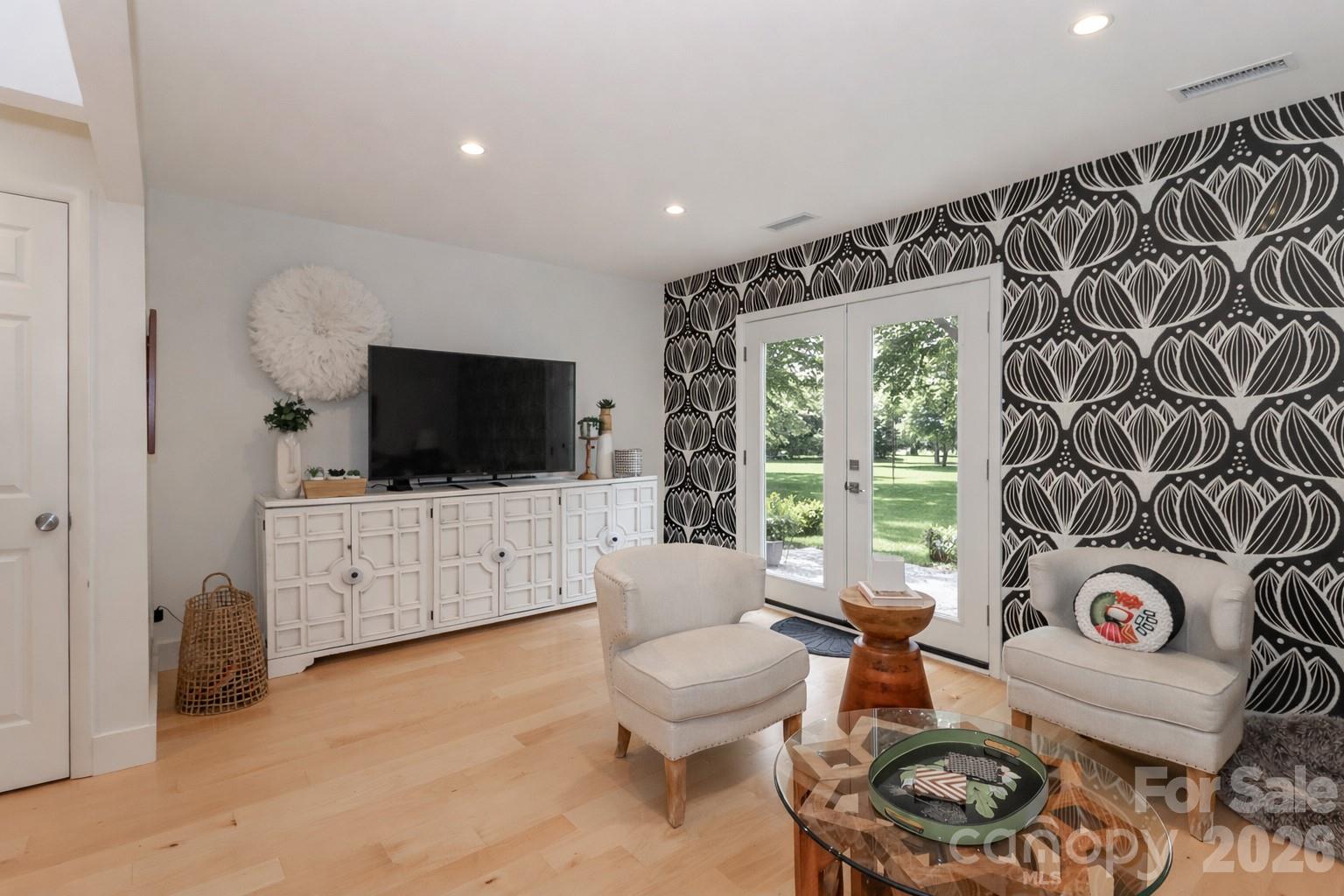 6622 Thermal Road Charlotte, NC 28211 - Photo 15 of 36 a living room with furniture and a flat screen tv