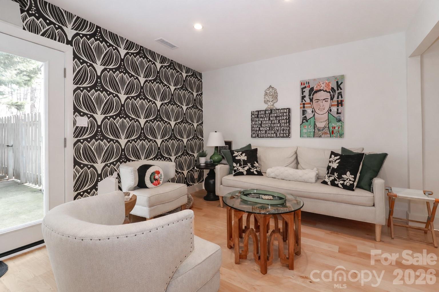 6622 Thermal Road Charlotte, NC 28211 - Photo 16 of 36 a living room with furniture and a potted plant