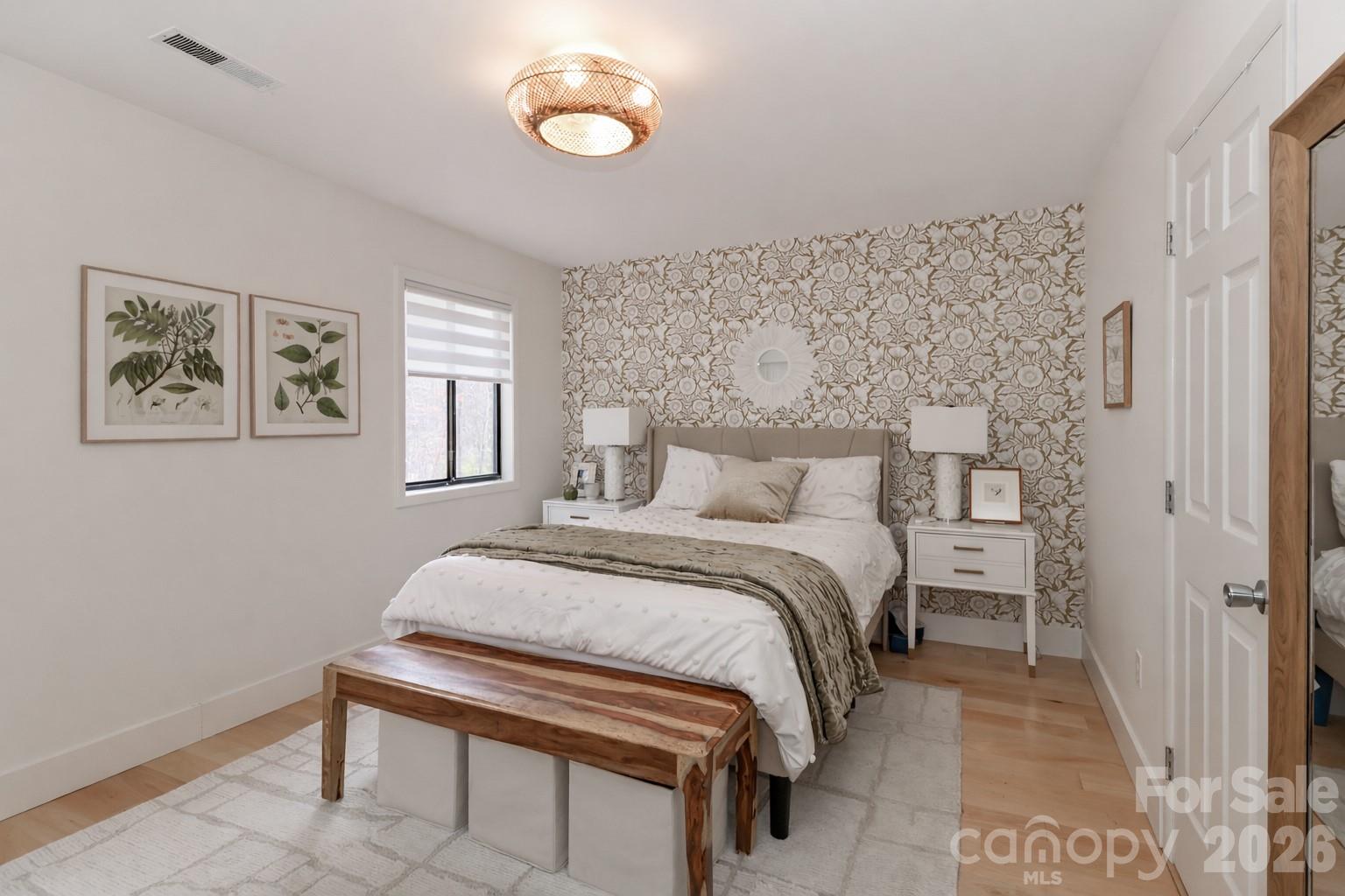 6622 Thermal Road Charlotte, NC 28211 - Photo 19 of 36 a bedroom with a bed and a table