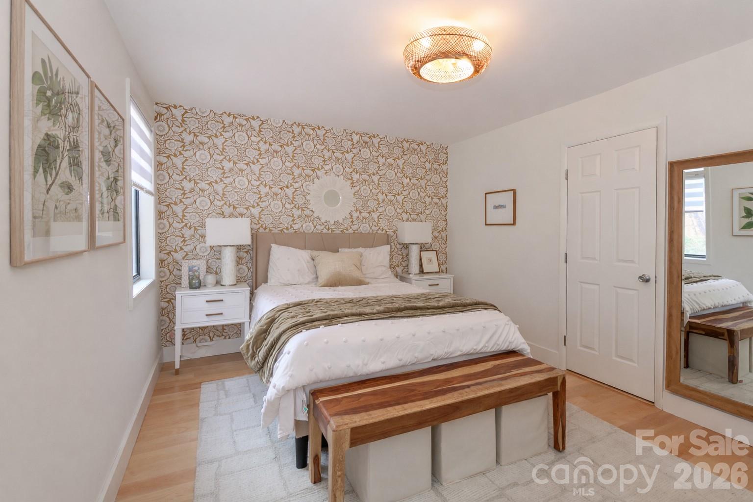 6622 Thermal Road Charlotte, NC 28211 - Photo 20 of 36 a bedroom with a bed and a mirror