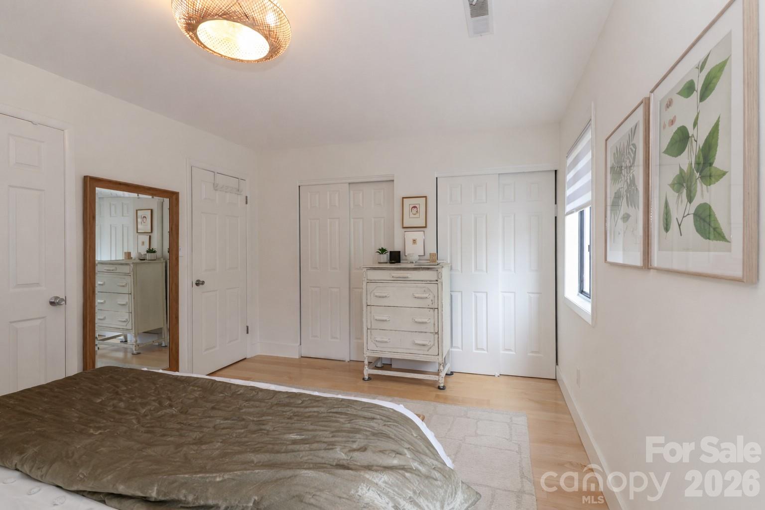 6622 Thermal Road Charlotte, NC 28211 - Photo 22 of 36 a view of a bedroom with closet and bathroom