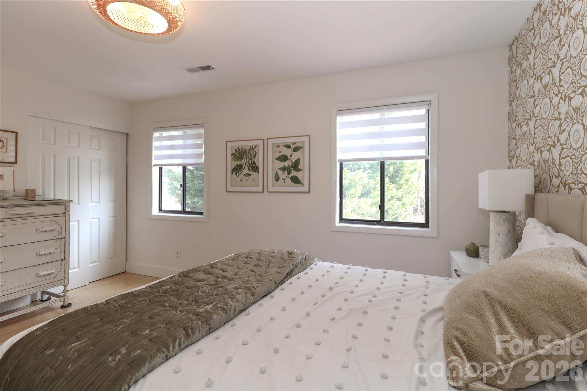 6622 Thermal Road Charlotte, NC 28211 - Photo 23 of 36 a bedroom with a bed and a window