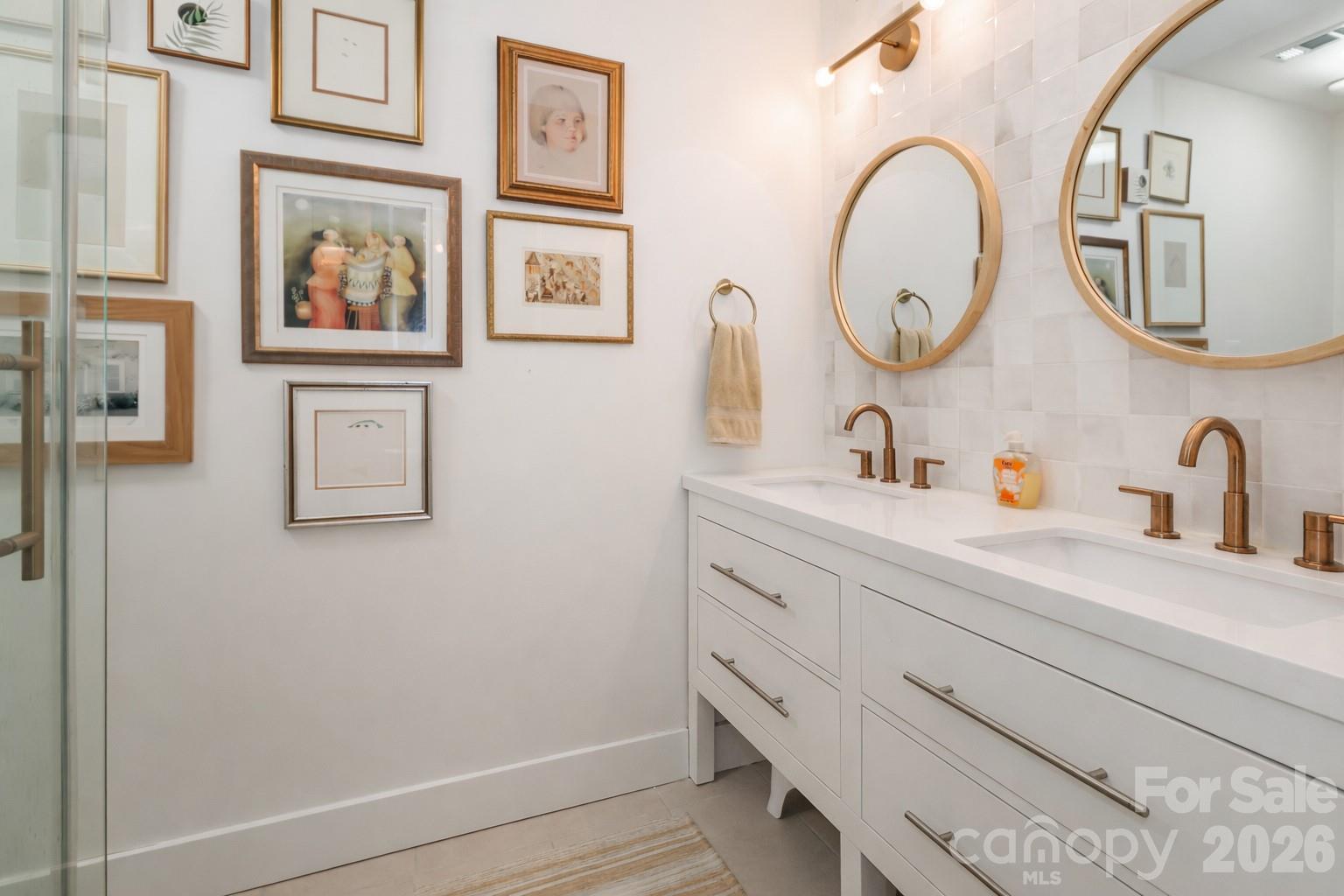 6622 Thermal Road Charlotte, NC 28211 - Photo 24 of 36 a bathroom with a sink and a mirror