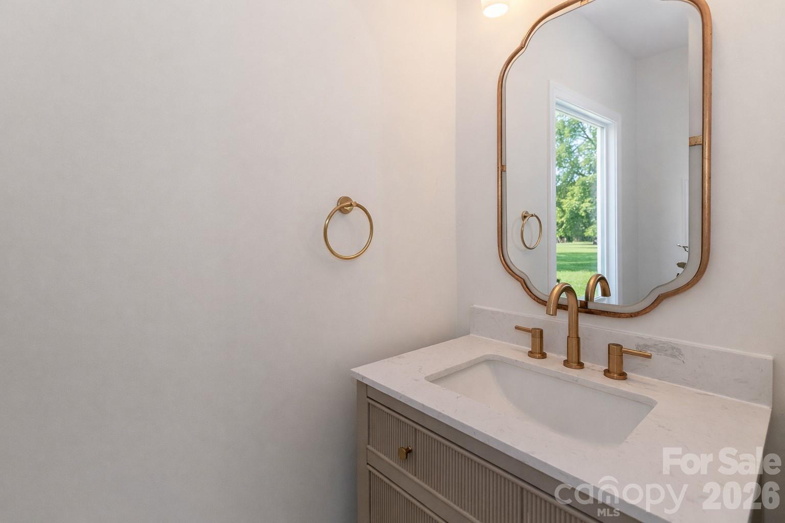 6622 Thermal Road Charlotte, NC 28211 - Photo 31 of 36 a bathroom with a sink and a mirror