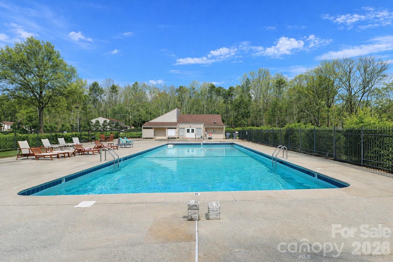 6622 Thermal Road Charlotte, NC 28211 - Photo 36 of 36 a view of a swimming pool and a yard