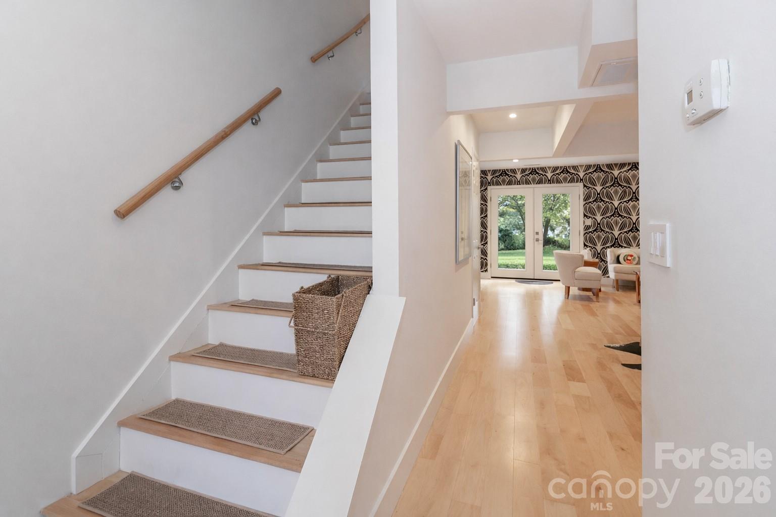 6622 Thermal Road Charlotte, NC 28211 - Photo 4 of 36 a view of entryway and hall with wooden floor