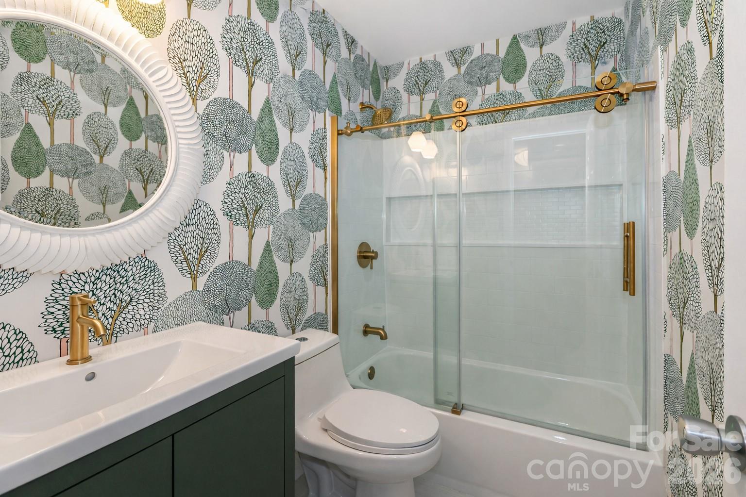 6622 Thermal Road Charlotte, NC 28211 - Photo 6 of 36 a bathroom with a sink a toilet and shower
