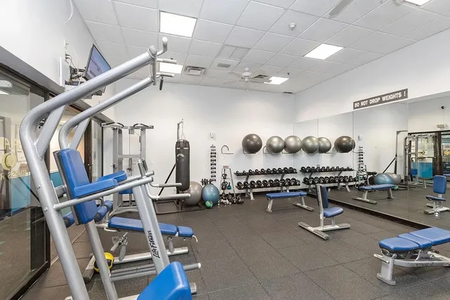 a view of a room with gym equipment