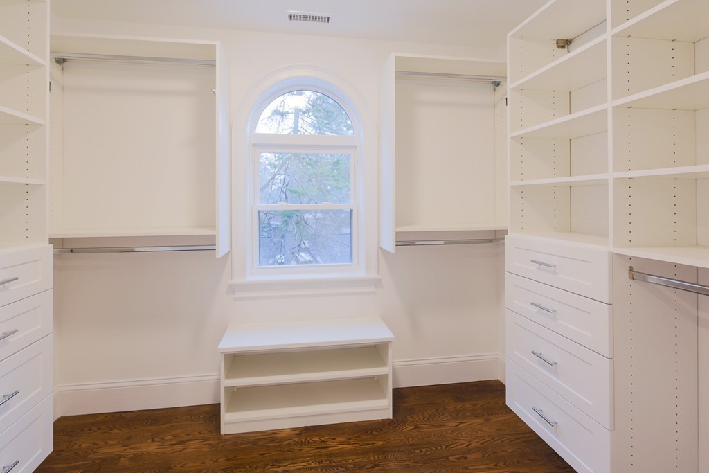 9 Holton Road Lexington, MA 02421 - Photo 15 of 27 a view of walk in closet with empty racks