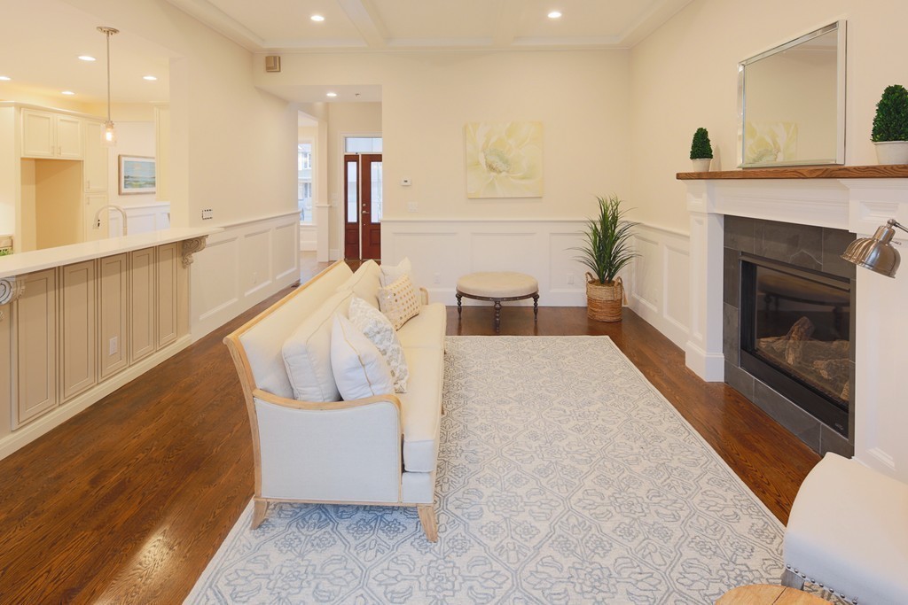 9 Holton Road Lexington, MA 02421 - Photo 4 of 27 a living room with furniture and a fireplace