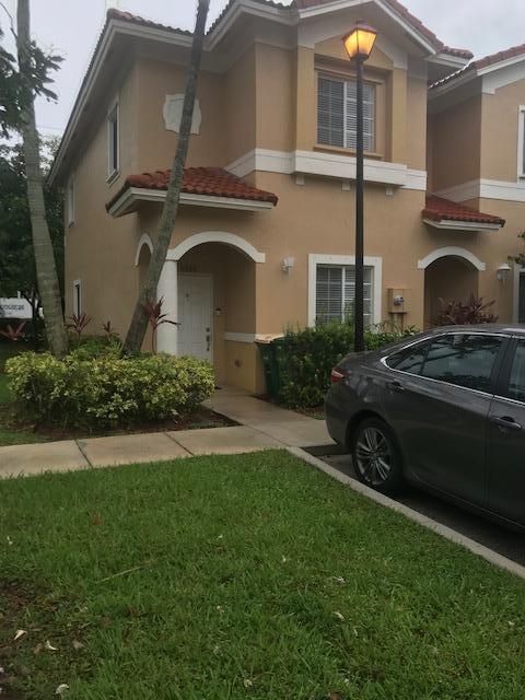 5928 Riverside Avenue Tamarac, FL 33321 - Photo 1 of 13 FRONT